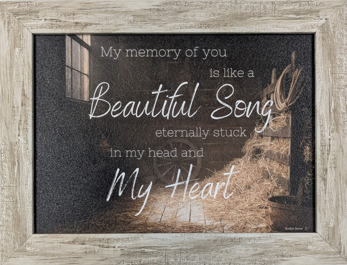 Framed quote on a white wall