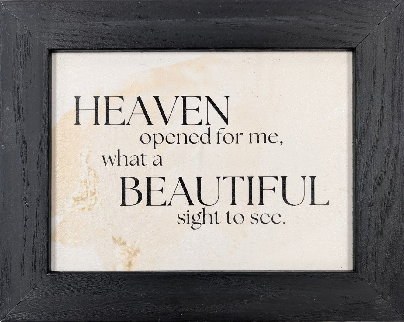 Framed quote 'Heaven opened for me, what a beautiful sight to see.' on a white background