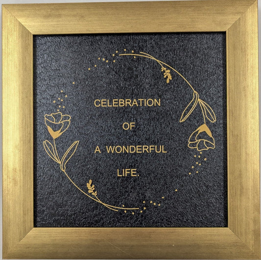 Framed artwork with 'Celebration of a Wonderful Life' text on a gray background