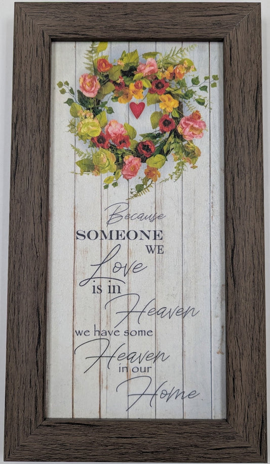 Framed artwork with floral design and text on a white background