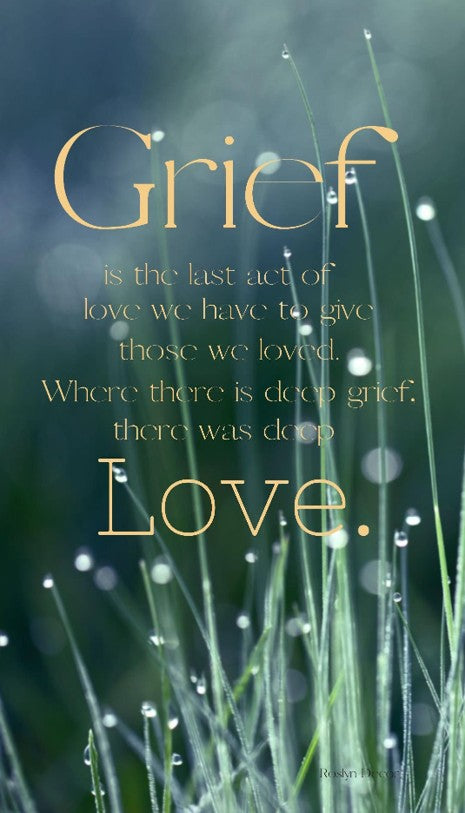 Text on a background of grass with dew drops and a blurred natural setting