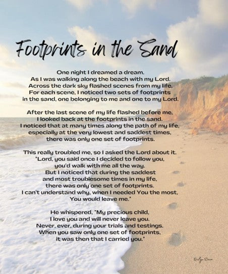 Text of 'Footprints in the Sand' poem on a beach with footprints in the sand.