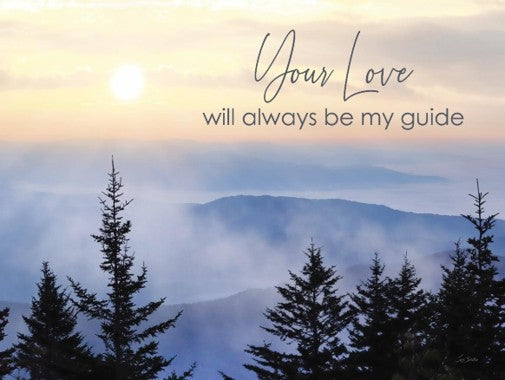 Mountains and trees with a quote 'Your love will always be my guide' against a sunset sky.